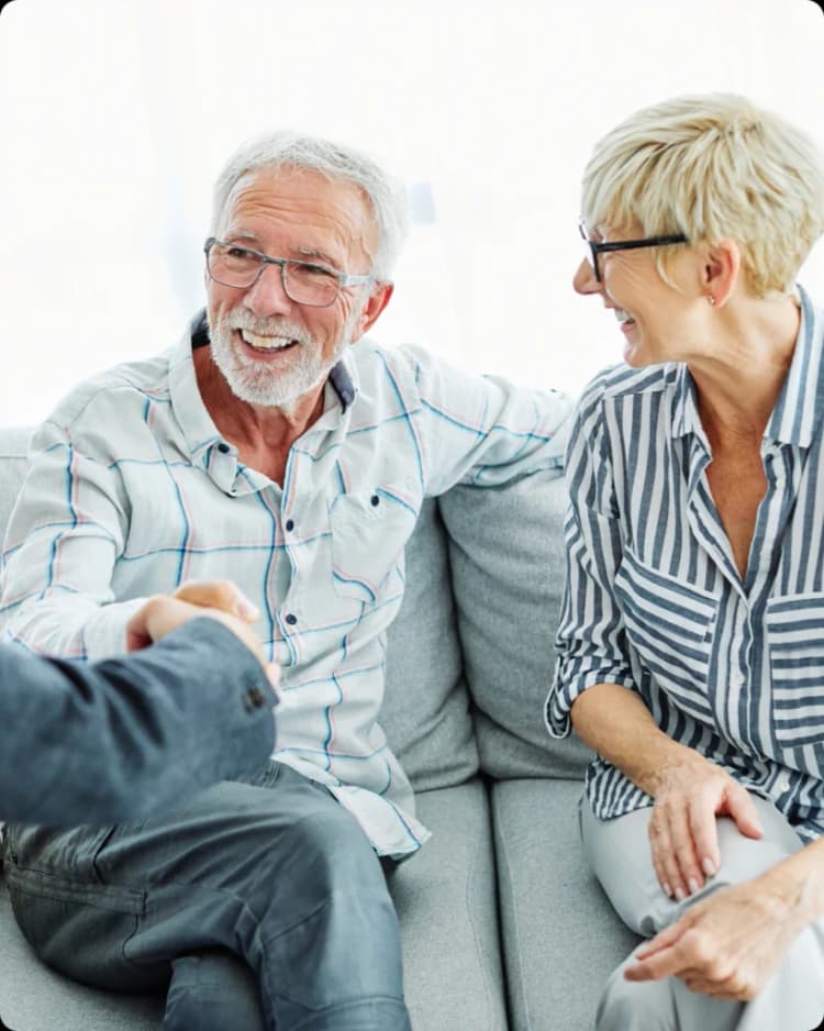 Older couple speaking with financial advisor